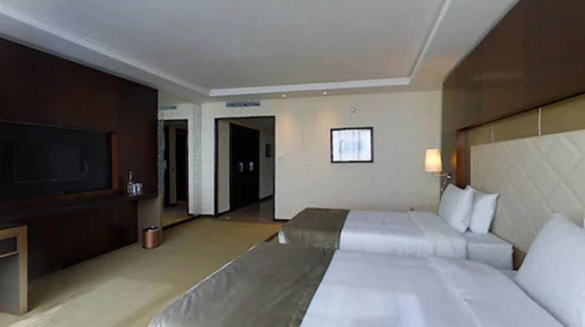 Grand Mogador City Center Касабланка Экстерьер фото A room at the hotel