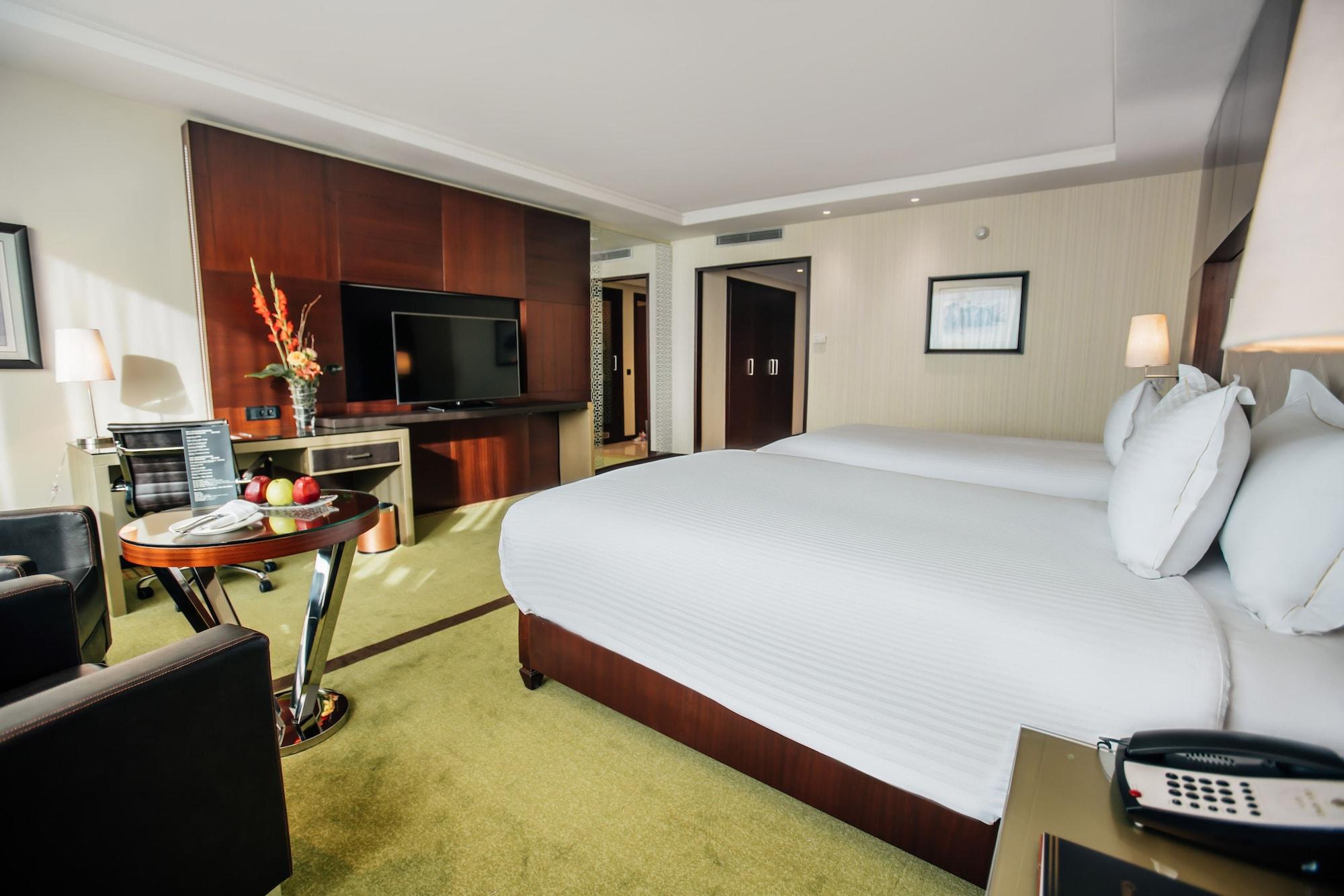 Grand Mogador City Center Касабланка Экстерьер фото A room at the hotel
