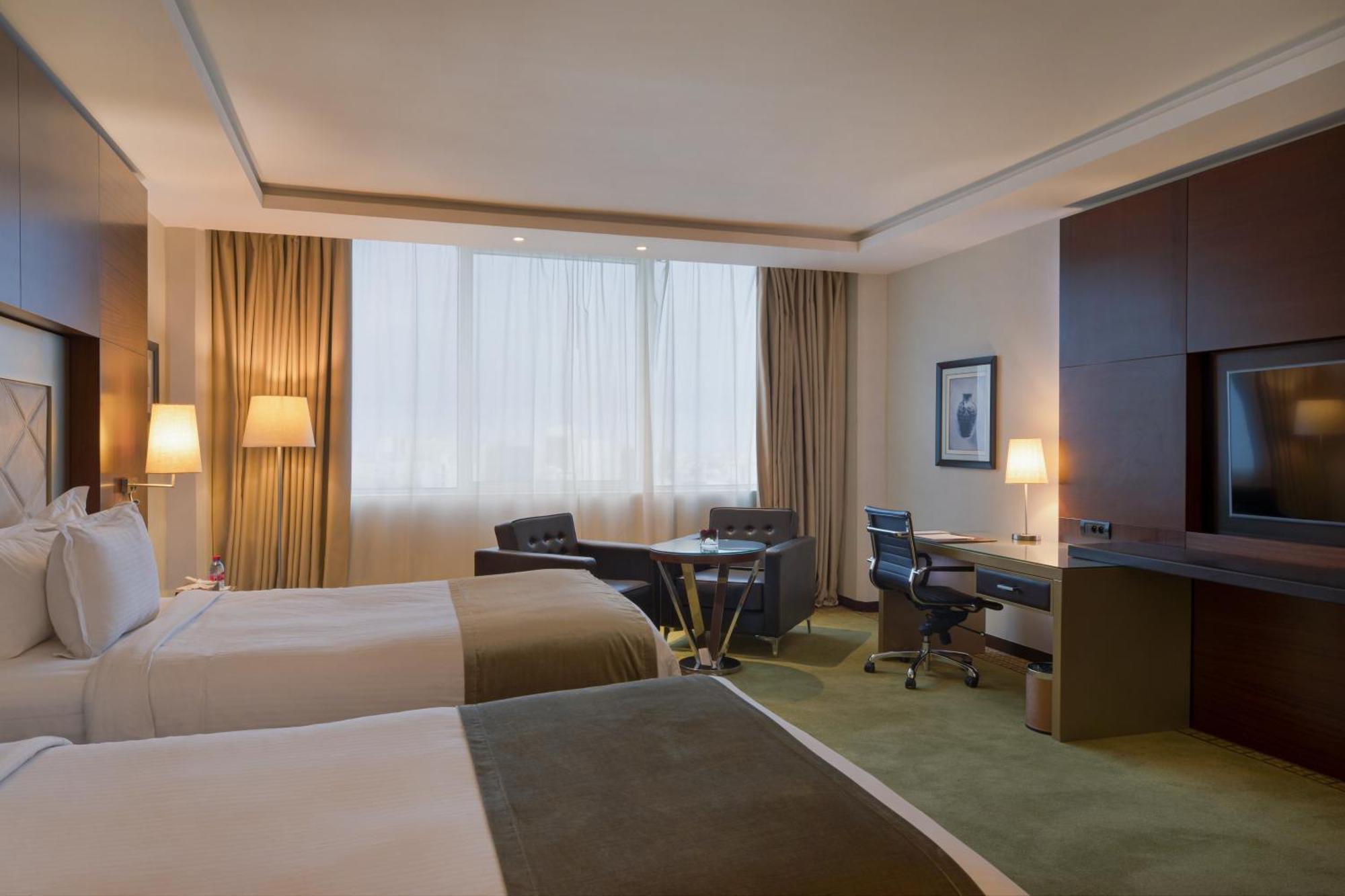 Grand Mogador City Center Касабланка Экстерьер фото A room at the hotel